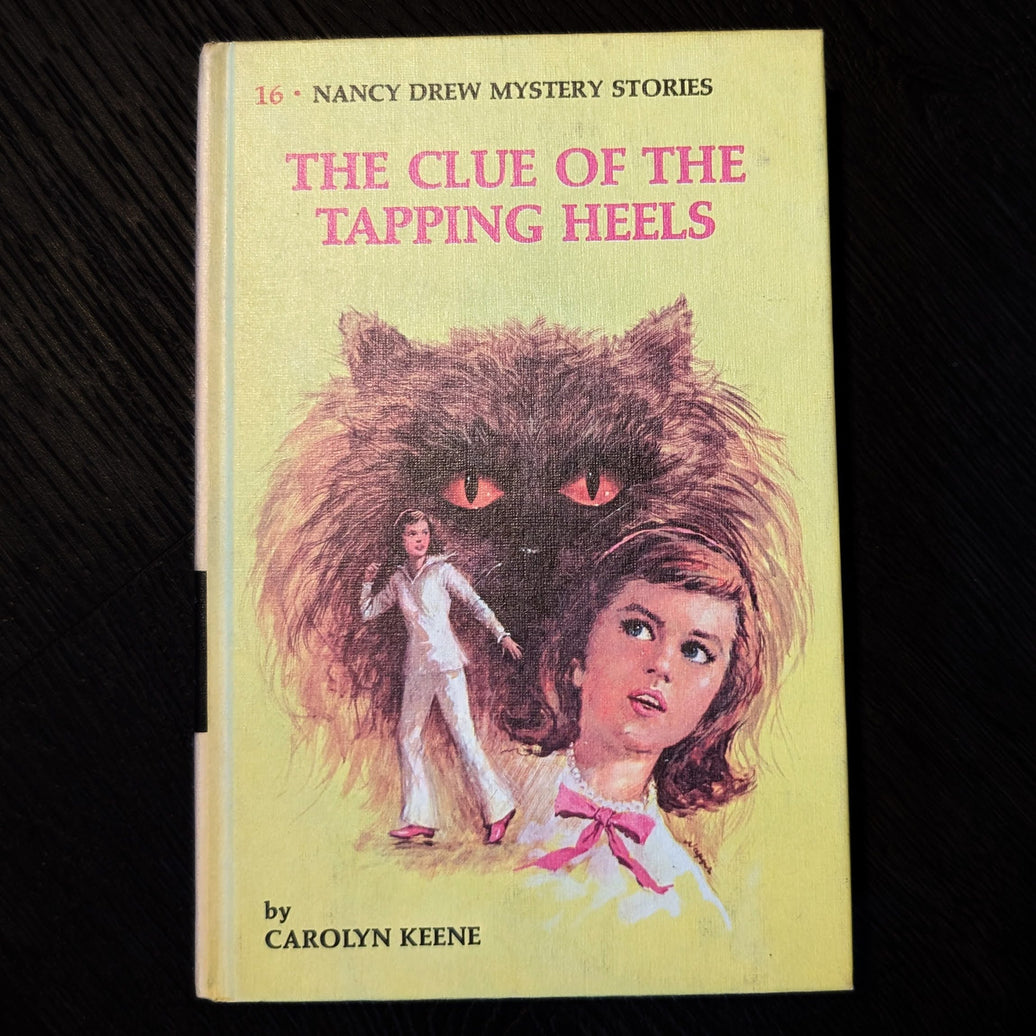 Hardcover Nancy Drew book The Clue of the Tapping Heels 1969 edition by Carolyn Keene Grosset & Dunlap Inc.