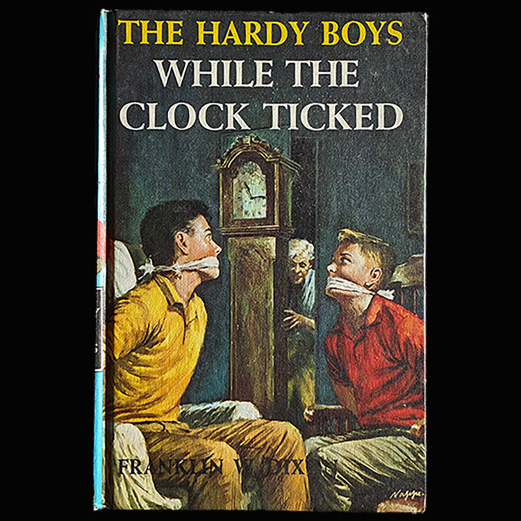 11 While the Clock Ticked (1962): Vintage Hardy Boys Book Blue-Back image 0