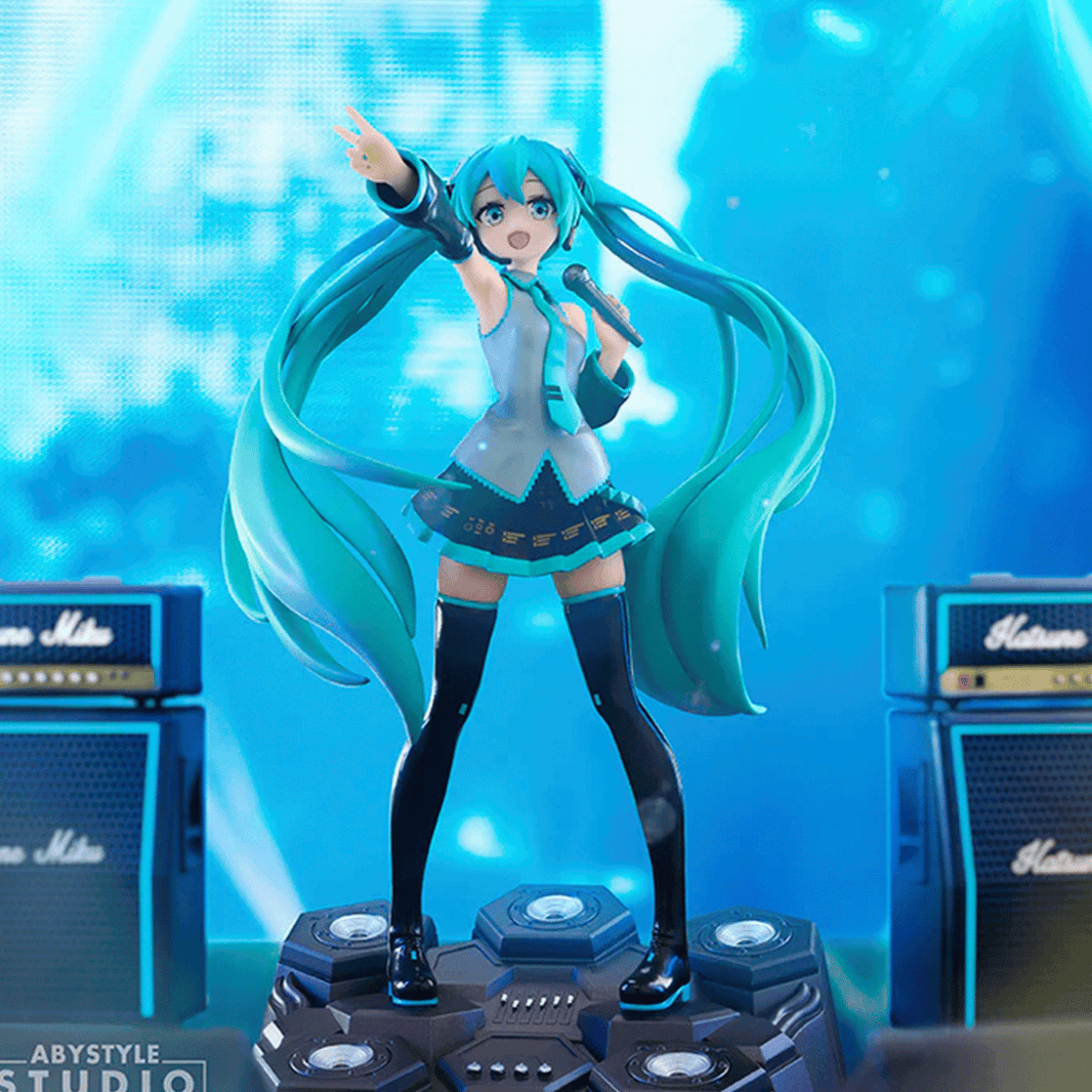 Abysse dynamic 1:10 scale Hatsune Miku statue with twin tails and microphone in energetic singing pose on futuristic stage base