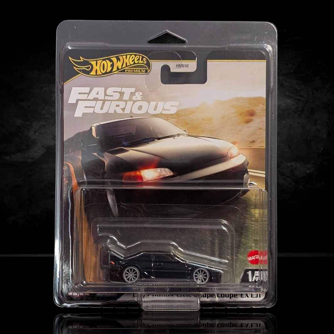 Hot Wheels Fast & Furious collectible die-cast car in premium packaging featuring black sports coupe design