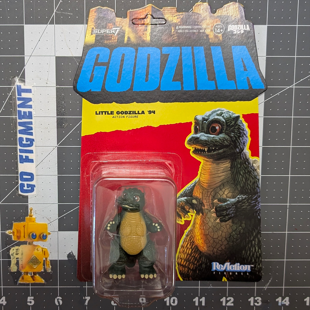 Little Godzilla 3 3/4-Inch ReAction Figure Super7 Toho Kaiju Collectible Figure new in box with retro Godzilla artwork packaging