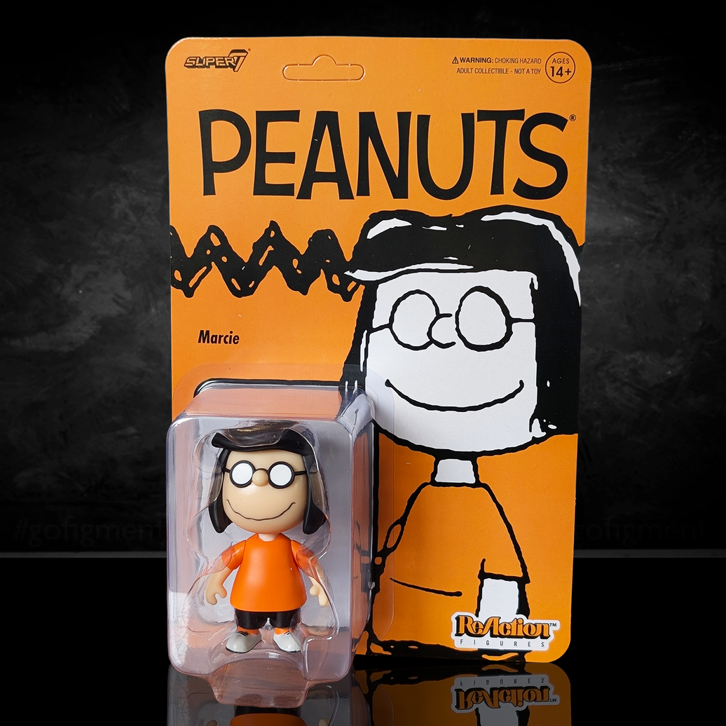 Peanuts character figurine in packaging with 'Peanuts' branding