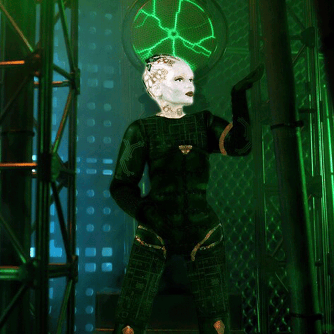 Mego 8-inch Borg Queen collectible figure with cybernetic details and striking green sci-fi background lighting