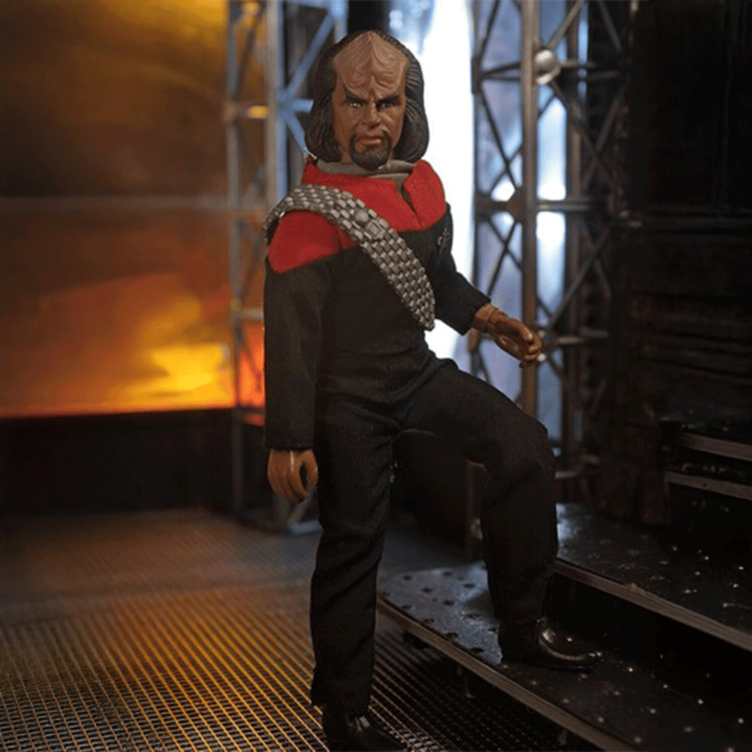 Lt. Worf Star Trek TNGRetro Style Articulated Mego Action Figure 8 inch posed on industrial sci-fi set by Mego