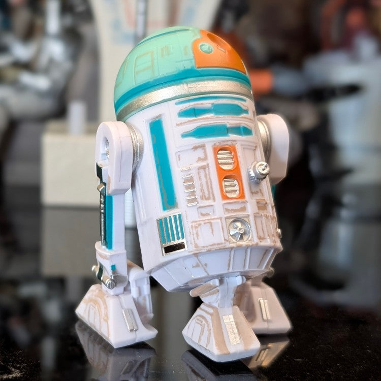 Kenner NO-AH Droid Factory Star Wars action figure with detailed weathering and vibrant orange and teal accents