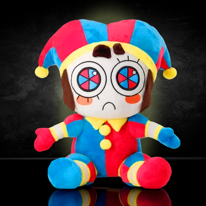 Soft plush toy dressed as a colorful jester with large round eyes and an expressive sad face