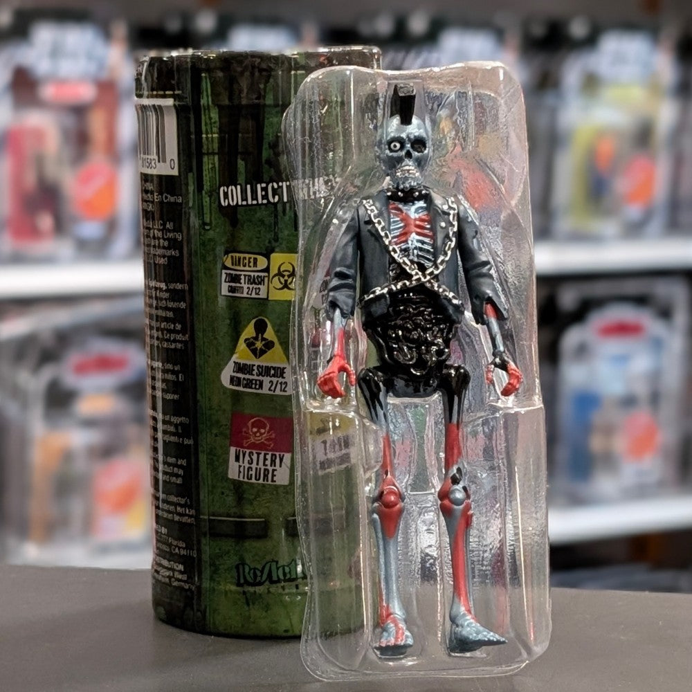 Super7 metallic blue graffiti male zombie figure with skeletal torso, chest bones, red highlights, and black jacket with chains in blister pack