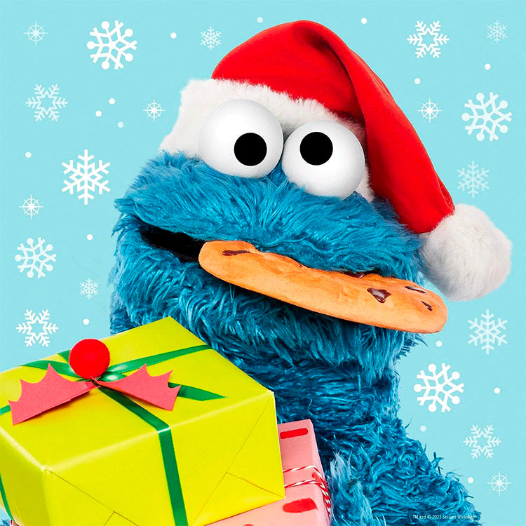 Sesame Street Cookie Monster wearing Santa hat holding cookie and presents with snowflakes by Master Pieces