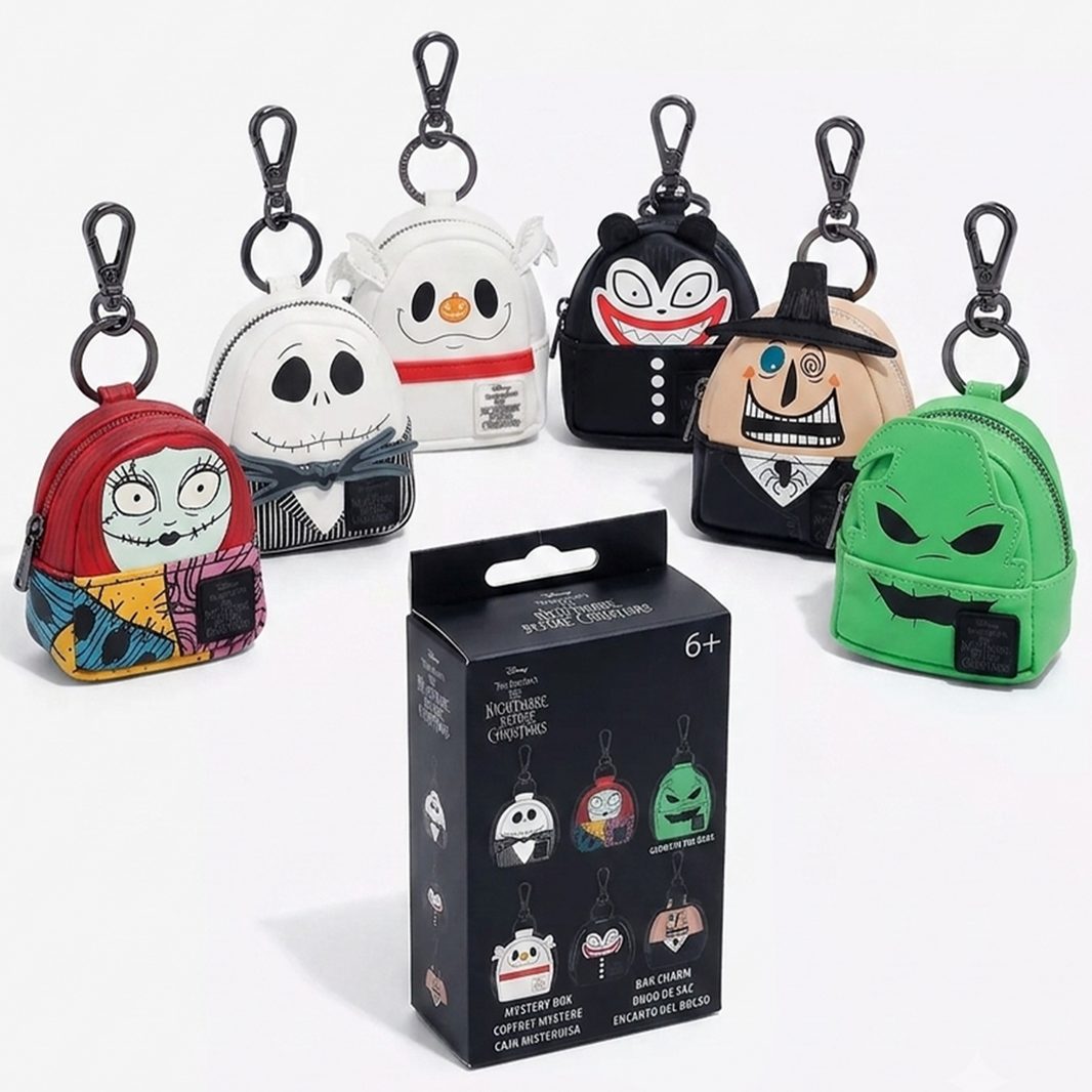 The Nightmare Before Christmas U-PICK Loungefly Mini-Backpack Mystery Box Bag Charm Key Chain set by Loungefly displayed.
