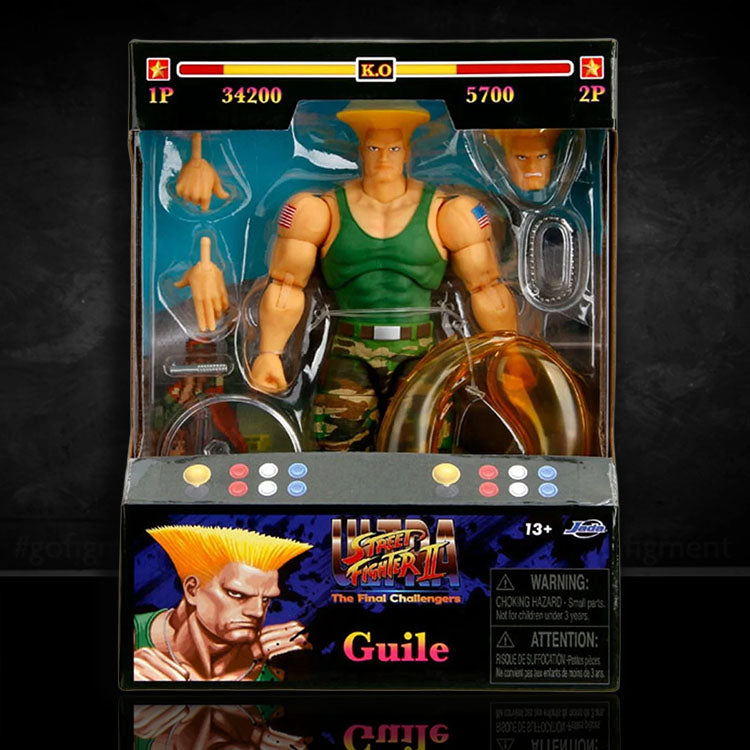 Jada Toys Ultra Street Fighter II Colonel Guile 6-inch action figure with accessories in arcade-style packaging