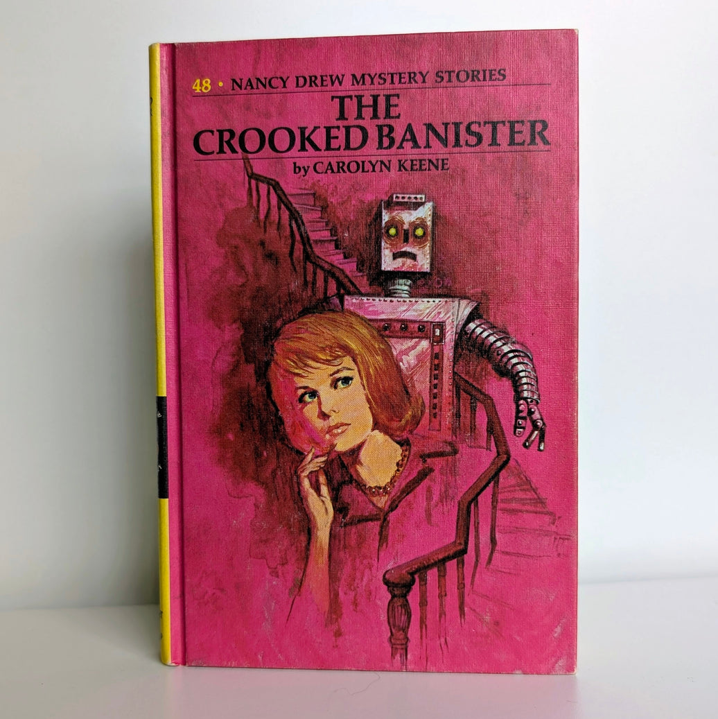 Vintage Grosset & Dunlap Nancy Drew Mystery Stories The Crooked Banister hardcover book with pink cover artwork