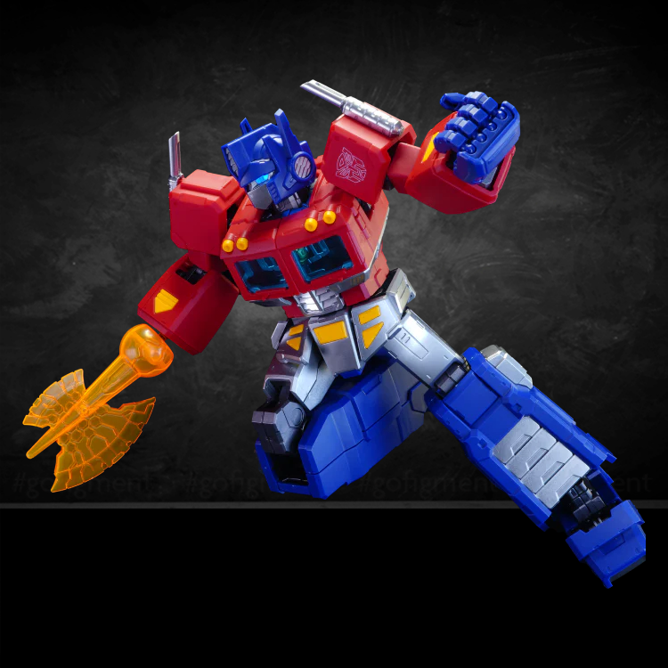 Blokees Figures Transformers Action Edition G1 Optimus Prime model kit posed with orange axe accessory by Hasbro