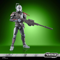 Kenner Star Wars Vintage Collection Crosshair action figure from The Bad Batch holding sniper rifle on green background