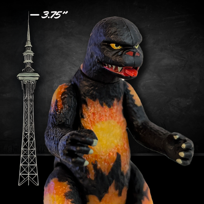 Close-up of Super7 Blazing Godzilla action figure with dark red and flame highlights against black background