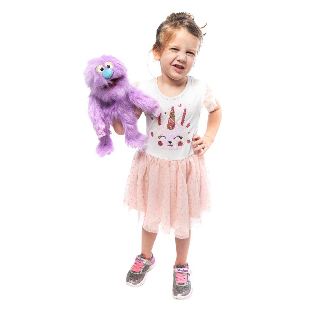 Silly Puppets - Silly Puppets Monster, Purple (14") plush with fuzzy purple fur and blue nose held by smiling young girl in pink tutu dress