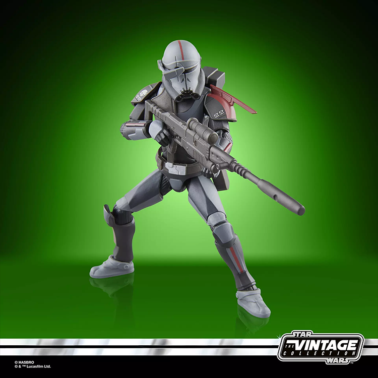 3.75 inch Kenner style Crosshair action figure from Star Wars Vintage Collection with sniper rifle on green background