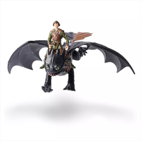 Spin Master How to Train Your Dragon Hiccup figure riding Toothless dragon with wings spread on white background