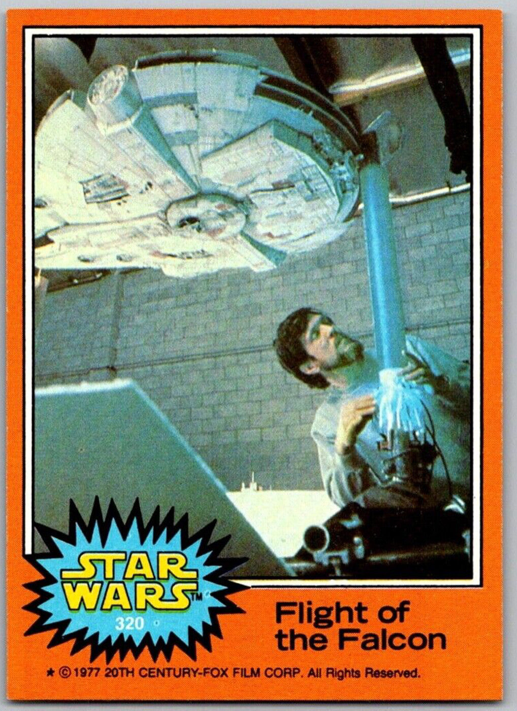 1977 TOPPS Star Wars Orange Series 4 card Flight of the Falcon featuring Han Solo and Millennium Falcon by Go Figment