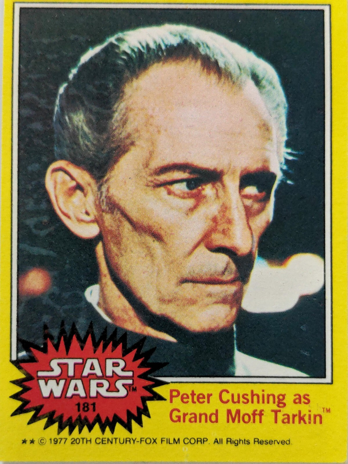1977 Topps Star Wars trading card featuring Peter Cushing as Grand Moff Tarkin yellow Series 3 card