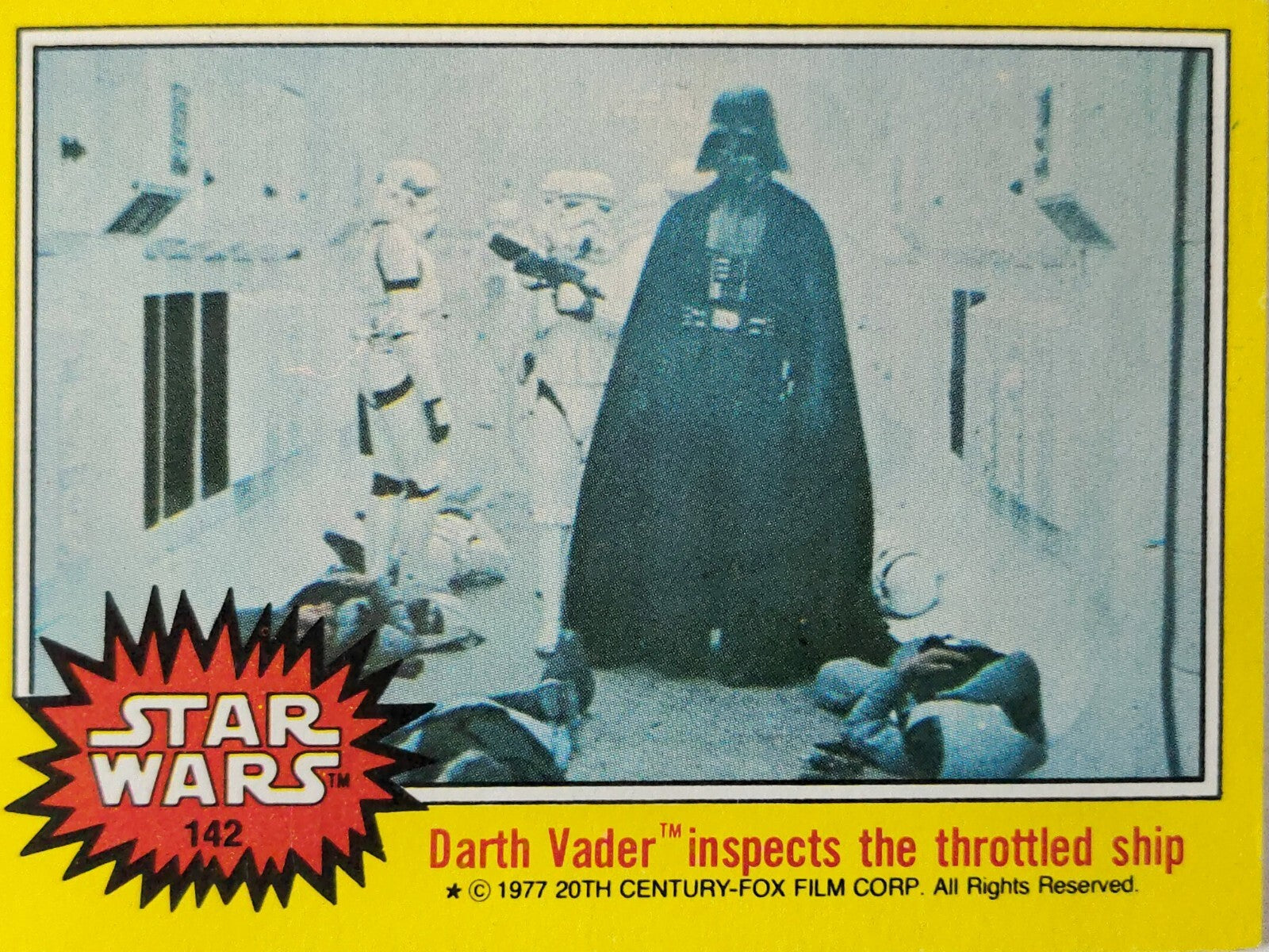 Topps 1977 Star Wars trading card featuring Darth Vader inspecting the throttled ship with stormtroopers