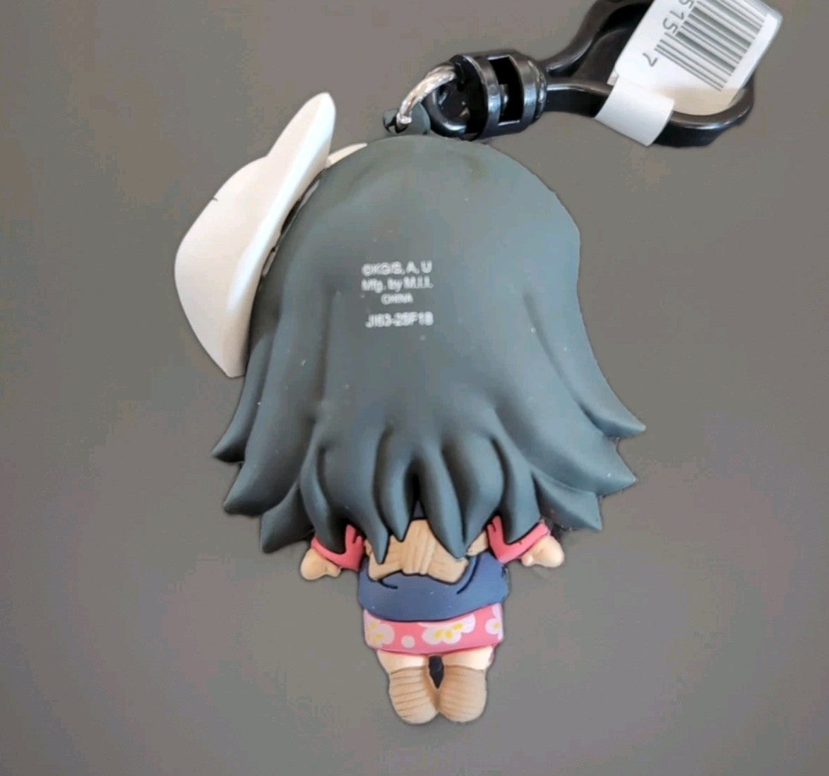 Back view of Monogram Demon Slayer Kimetsu no Yaiba character in 3D foam PVC bag clip keychain