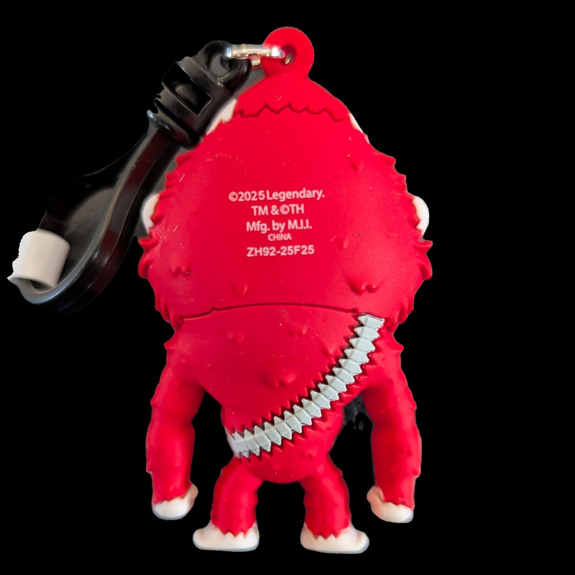 Back view of Monogram's 3D foam Scar King Godzilla Kong bag clip keychain made in China 2025