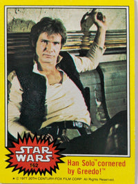 1977 Topps Star Wars trading card featuring Han Solo cornered by Greedo with yellow border Series 3