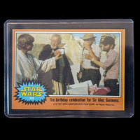 1977 Topps Star Wars Trading Card 309 birthday celebration for Sir Alec Guinness encased by Go Figment