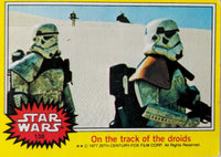 1977 Topps Star Wars trading card featuring two stormtroopers in desert with "On the track of the droids" text