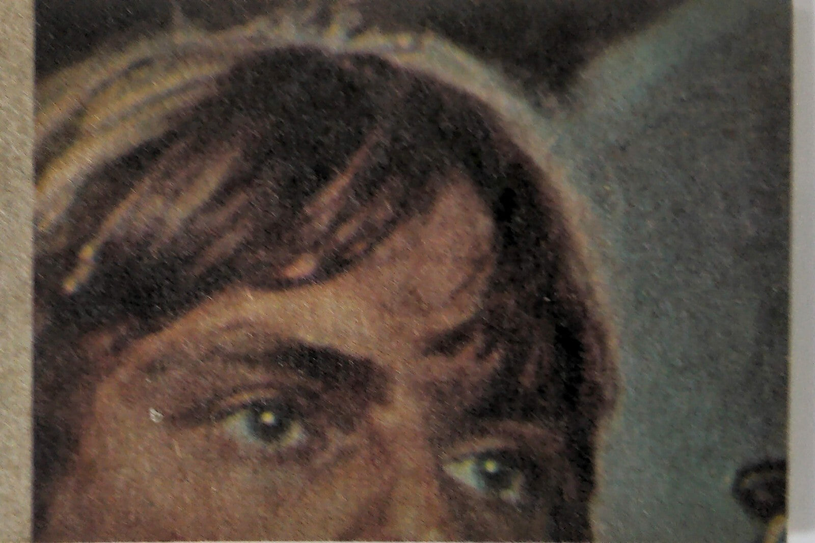 Close-up of 1977 Topps Star Wars YELLOW Series 3 trading card featuring Luke Skywalker face detail
