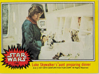 1977 Topps Star Wars Trading Card featuring Luke Skywalker's aunt preparing dinner scene