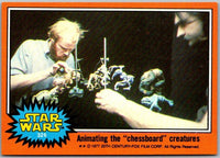 1977 TOPPS STAR WARS Trading Card Orange Series 4 animators working on chessboard creatures Go Figment