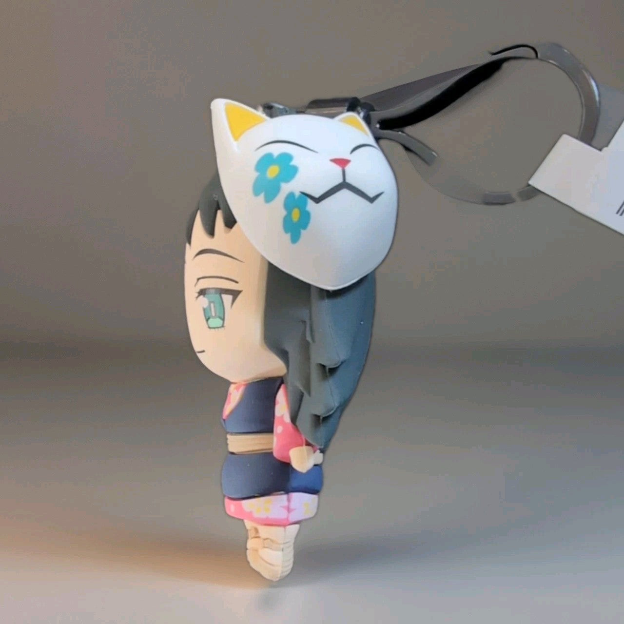 Monogram Kimetsu no Yaiba Demon Slayer 3-inch 3D foam PVC keychain featuring a character with a fox mask and braided hair.
