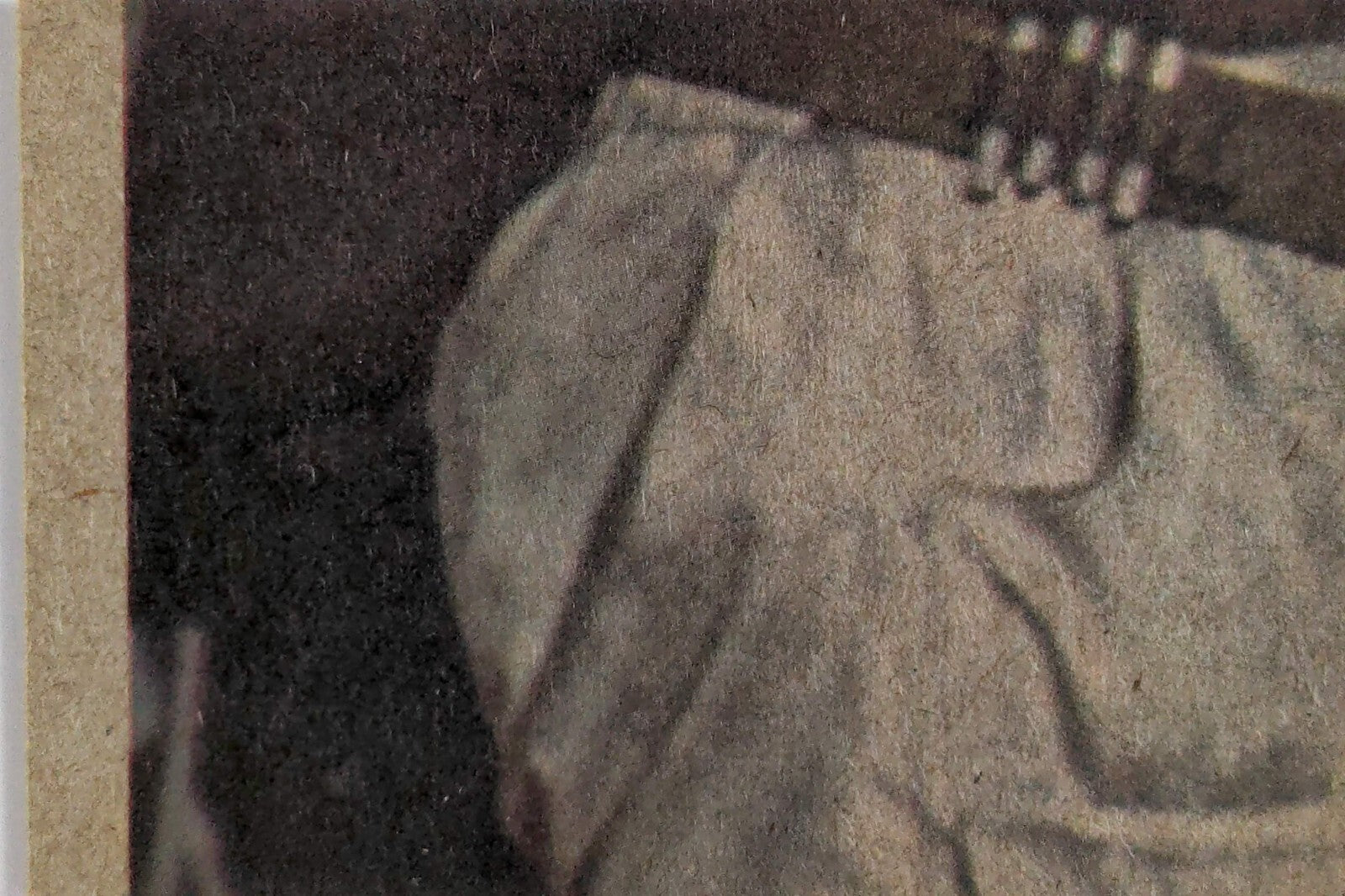 Close-up of 1977 Topps Star Wars trading card showing detailed costume texture from Yellow Series 3 set