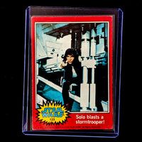 1977 Topps Star Wars trading card featuring Han Solo with blaster aimed at stormtrooper sold by Go Figment