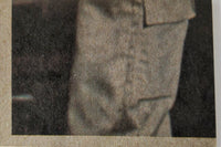Close-up detail of vintage 1977 Topps Star Wars yellow Series 3 trading card textured surface