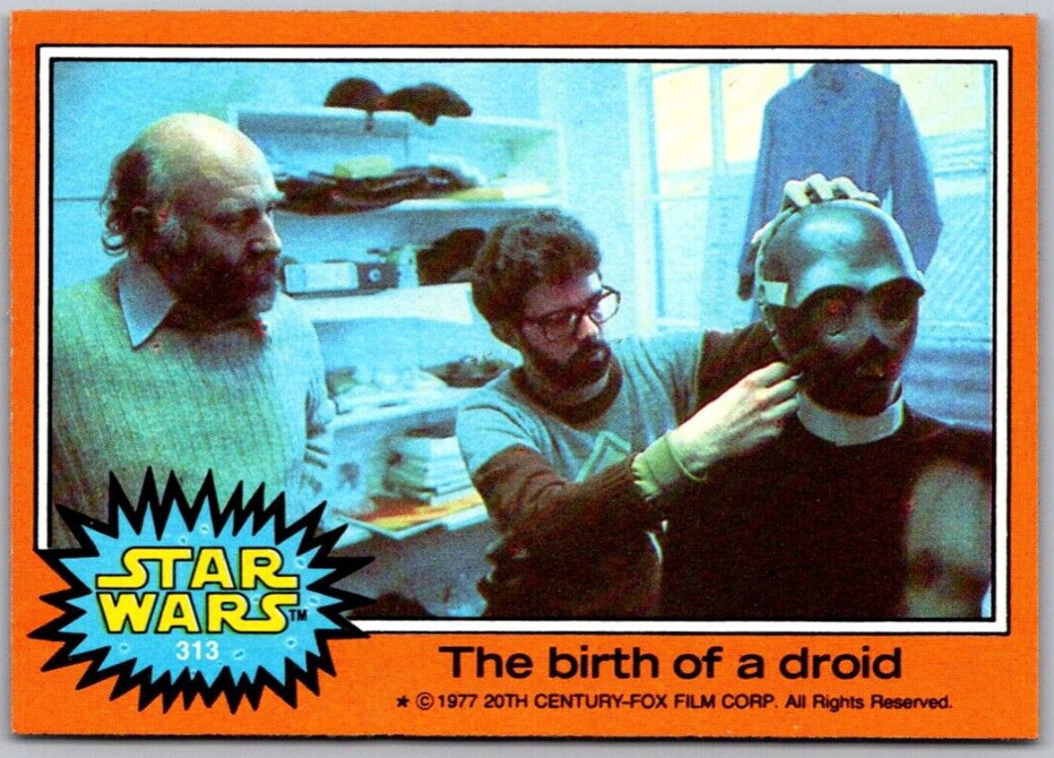 1977 Go Figment TOPPS Star Wars orange series card 313 showing behind the scenes droid head creation