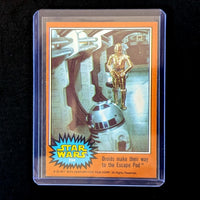 1977 Topps Star Wars Orange Series 4 trading card 294 with droids R2-D2 and C-3PO in escape pod Go Figment