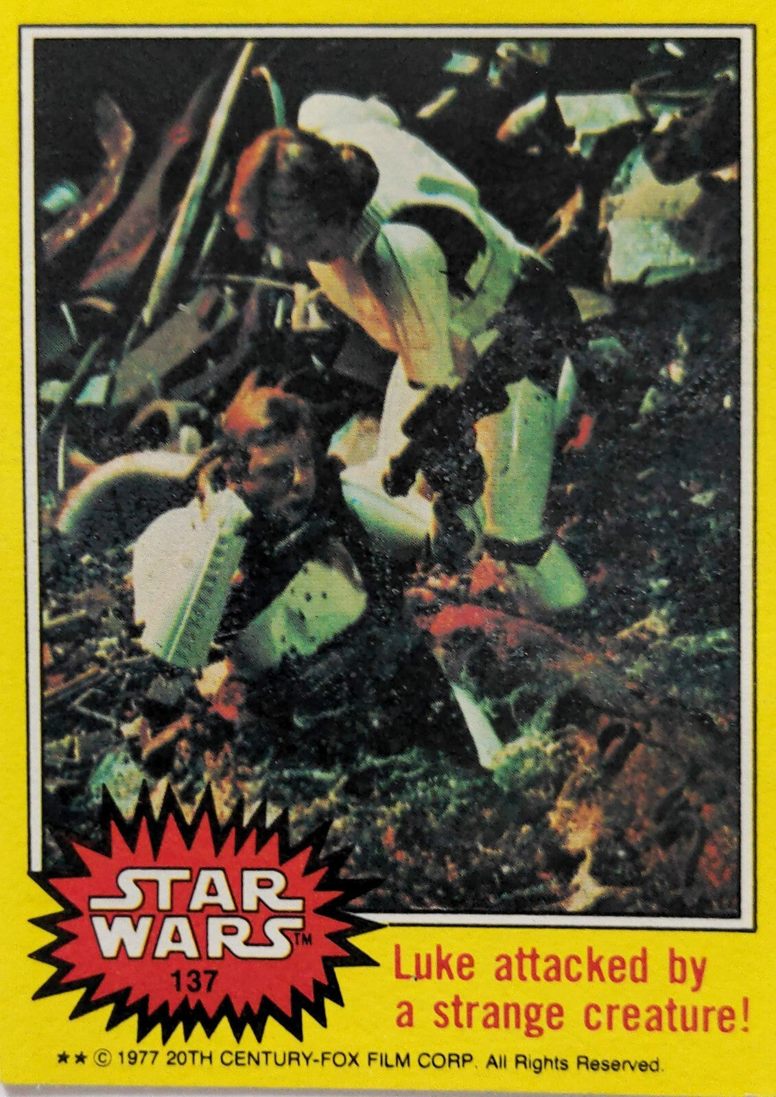 1977 Topps Star Wars trading card showing Luke Skywalker attacked by a strange creature scene from movie