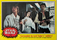 1977 Topps Star Wars yellow series 3 trading card featuring Luke Skywalker, Princess Leia, and Han Solo
