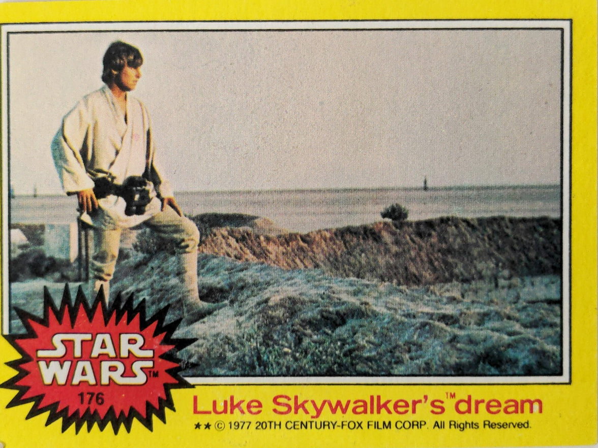 1977 Topps Star Wars yellow Series 3 trading card featuring Luke Skywalker standing on rocky terrain with ocean background