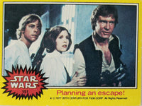 1977 Topps Star Wars trading card featuring Luke Skywalker, Princess Leia, and Han Solo planning an escape scene
