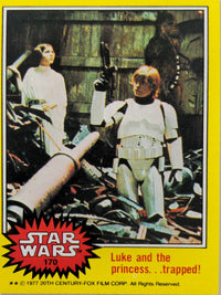 1977 Topps Star Wars trading card 170 Luke Skywalker in stormtrooper outfit with Princess Leia and Chewbacca