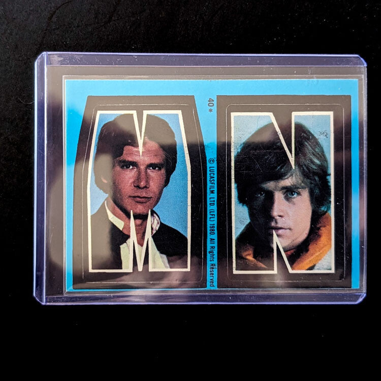 1980 Topps Empire Strikes Back collectible Star Wars sticker with Han Solo and Luke Skywalker, offered by Go Figment.