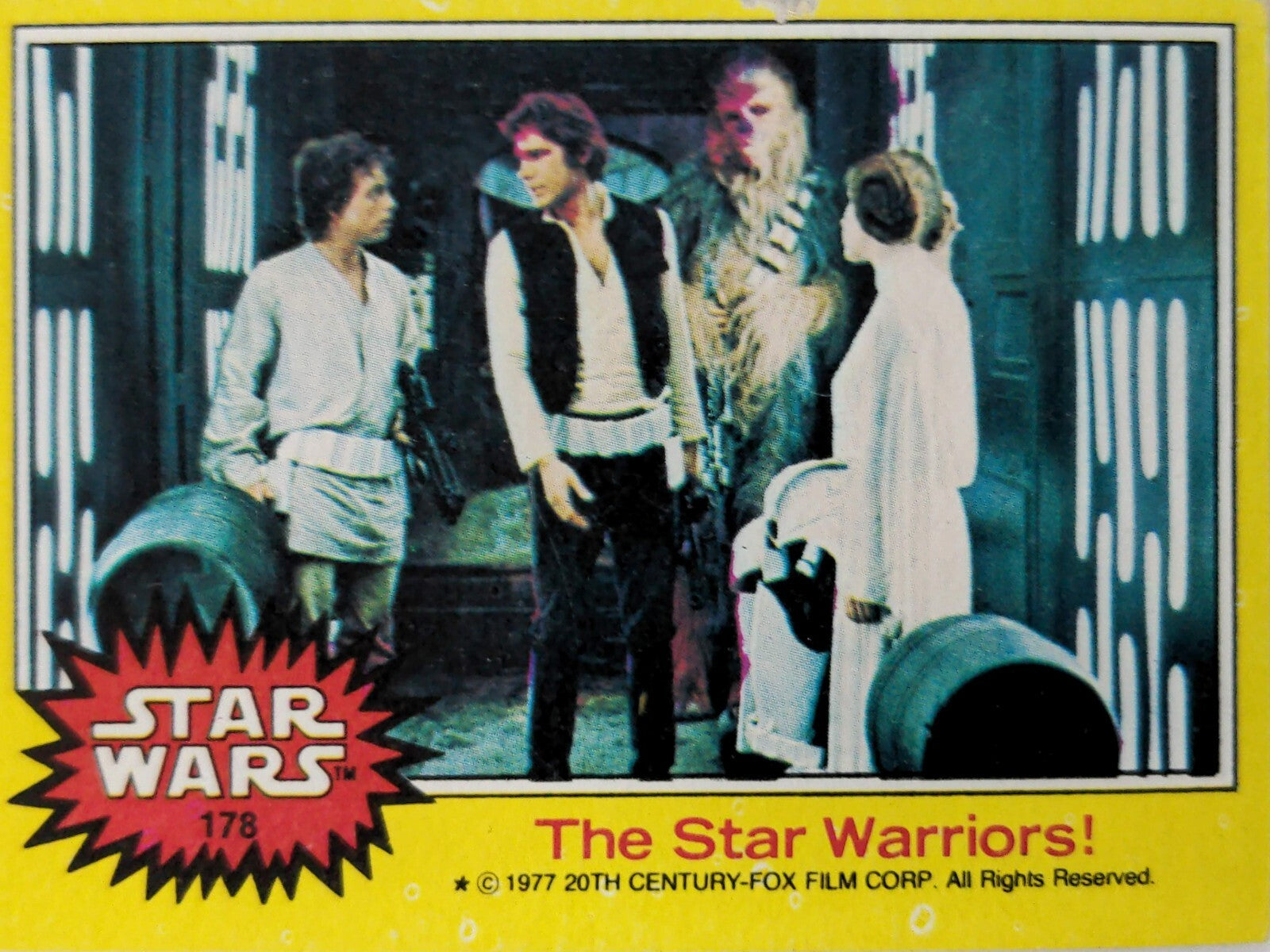 1977 TOPPS Star Wars yellow series 3 vintage trading card featuring main characters Luke, Han, Chewbacca, and Leia