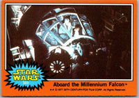 1977 Topps Star Wars Orange Series 4 trading card 323 featuring Millennium Falcon cockpit scene by Go Figment