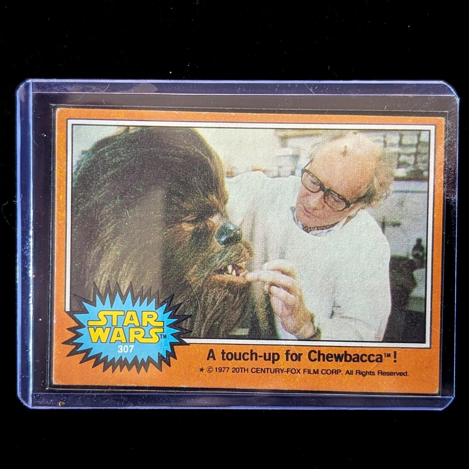 1977 TOPPS STAR WARS trading card Series 4 featuring Chewbacca touch-up by artist in protective sleeve by Go Figment