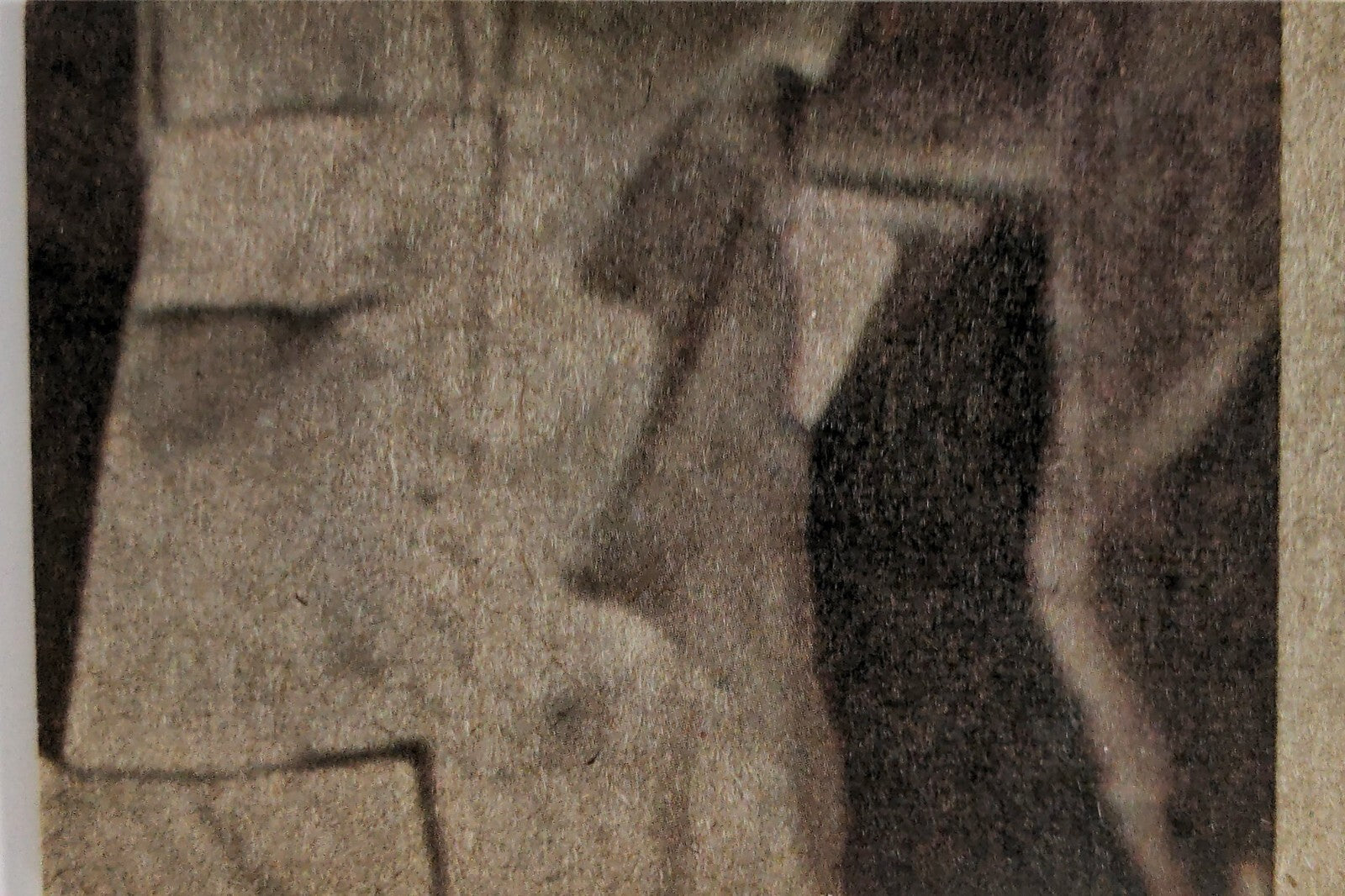 Close-up of vintage 1977 Topps Star Wars yellow Series 3 trading card corner with textured background