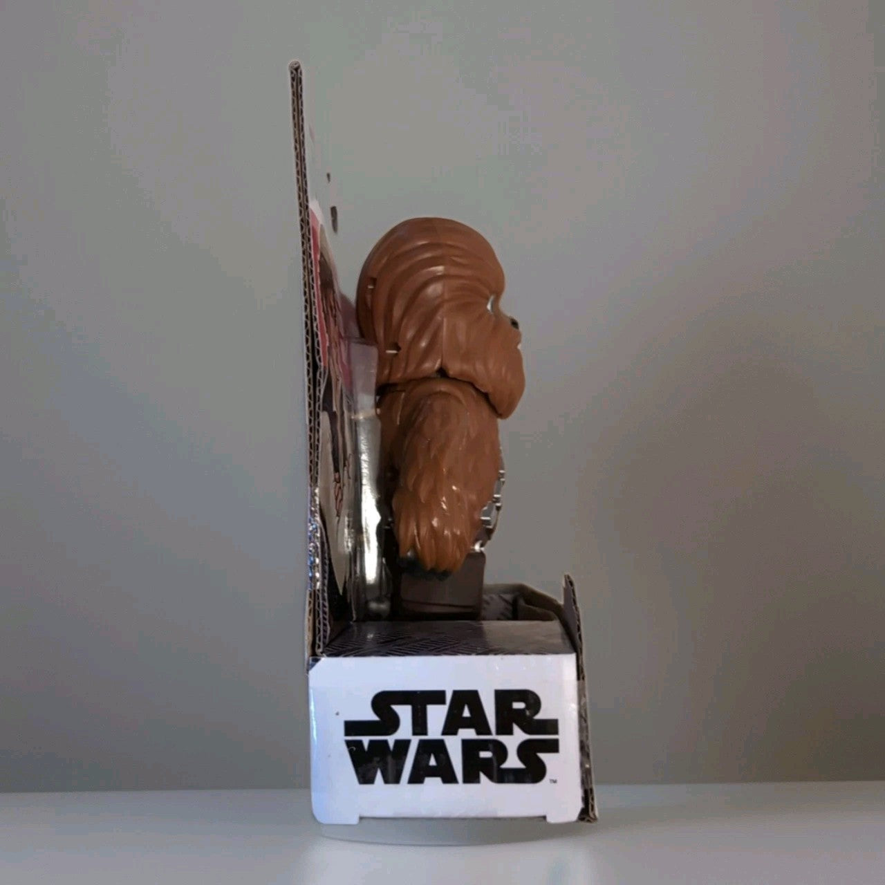 Hasbro Star Wars Chewbacca Bop It game side view in original packaging with Star Wars logo visible