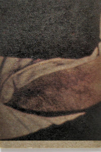 Close-up of vintage 1977 Topps Star Wars YELLOW Series 3 trading card corner with aged paper texture